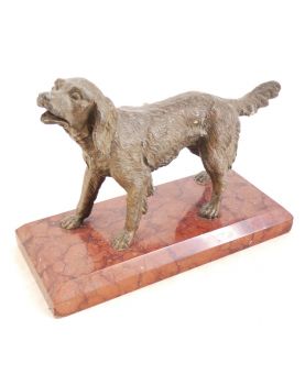 Small Hunting Dog in Regulates on Marble Base